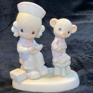 Precious Moments Love Beareth All Things